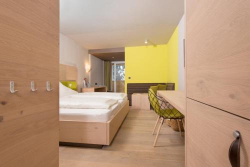 Imagen de la habitación del Hotel Familotel Alphotel. Foto 15