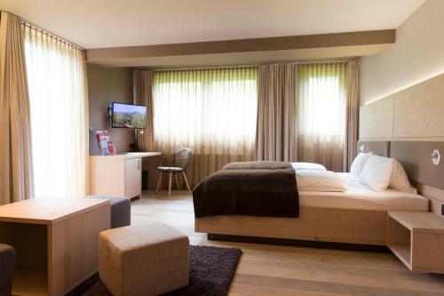 Imagen de la habitación del Hotel Familotel Alphotel. Foto 19