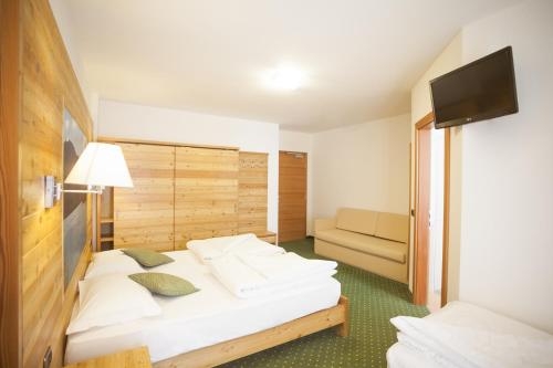 Imagen de la habitación del Hotel Family Adriana. Foto 9