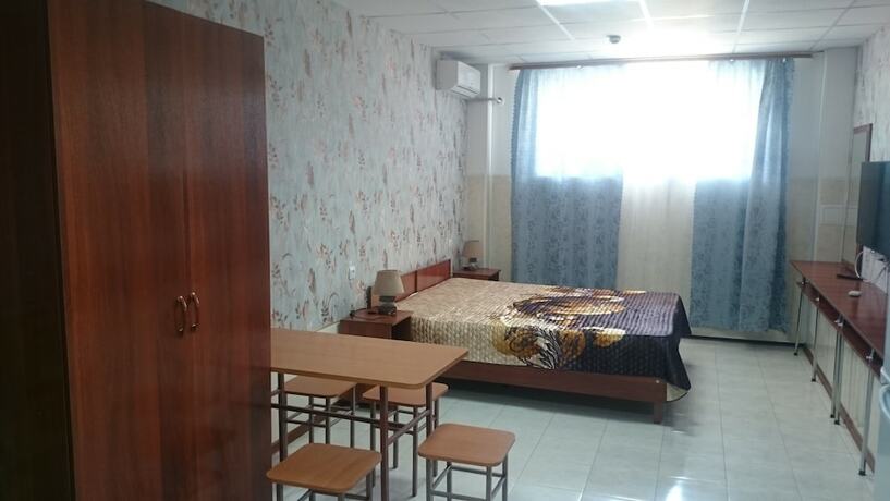 Imagen de la habitación del Hotel Family Apartments, Novomikhaylovskiy. Foto 19