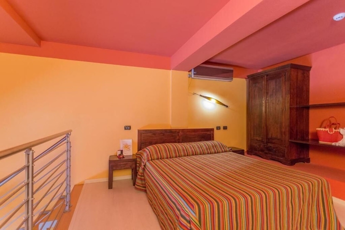 Imagen de la habitación del Hotel Family Beach Village Regina Del Mare. Foto 9