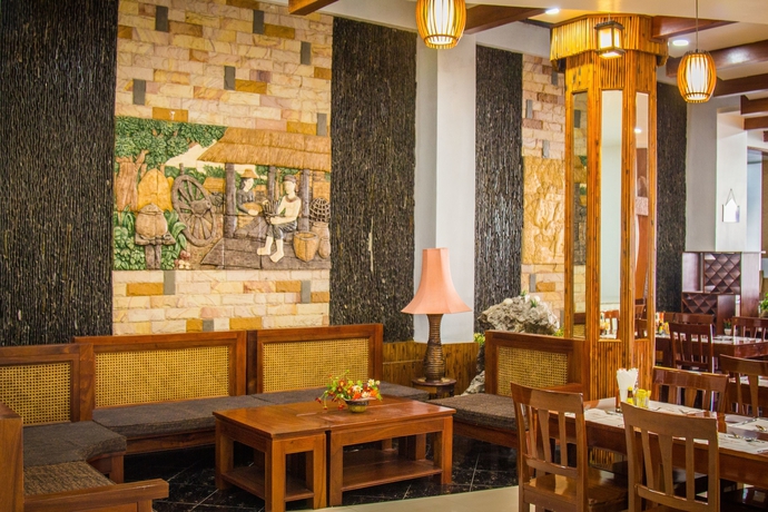 Imagen del bar/restaurante del Hotel Family Boutique. Foto 3