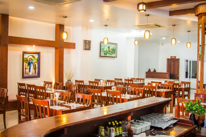 Imagen del bar/restaurante del Hotel Family Boutique. Foto 4