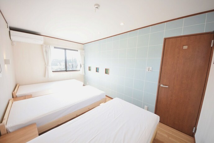 Imagen de la habitación del Hotel Family Cottage Notoie. Foto 21