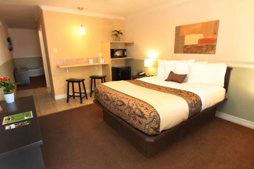 Imagen de la habitación del Hotel Family Garden Inn and Suites. Foto 6