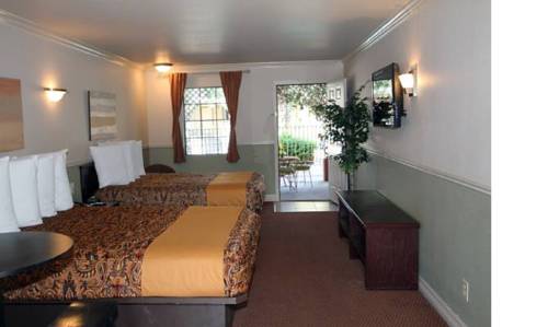 Imagen de la habitación del Hotel Family Garden Inn and Suites. Foto 8