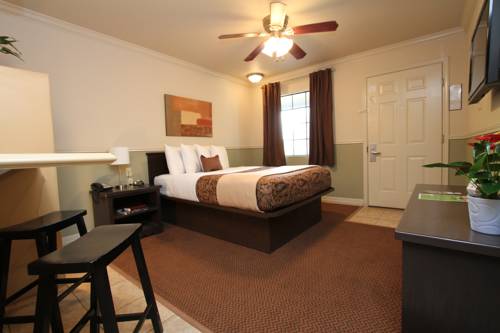 Imagen de la habitación del Hotel Family Garden Inn and Suites. Foto 10