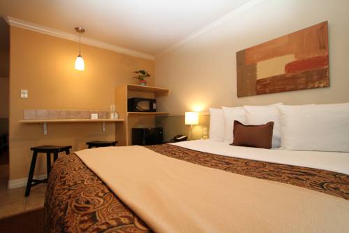 Imagen de la habitación del Hotel Family Garden Inn and Suites. Foto 12