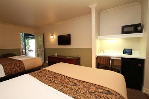 Imagen de la habitación del Hotel Family Garden Inn and Suites. Foto 15