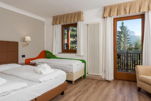 Imagen de la habitación del Hotel Family Gran Baita. Foto 8