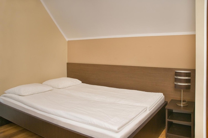 Imagen de la habitación del Hotel Family Homes - Sand Residence. Foto 12