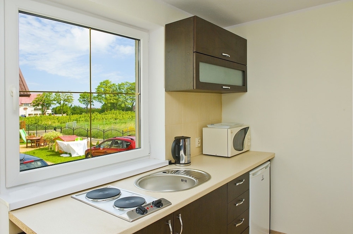 Imagen de la habitación del Hotel Family Homes - Sand Residence. Foto 15