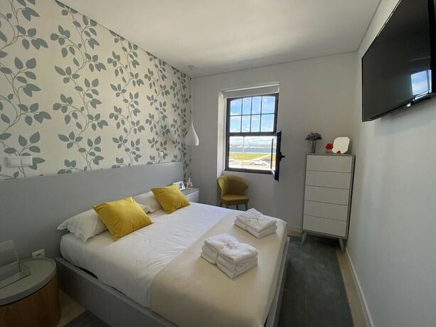 Imagen de la habitación del Hotel Family Hostel Costa Nova. Foto 15