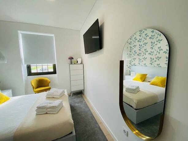 Imagen de la habitación del Hotel Family Hostel Costa Nova. Foto 20