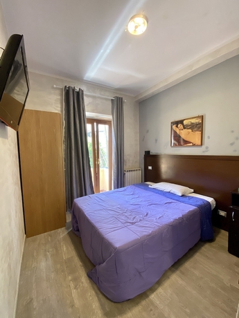 Imagen de la habitación del Hotel Family House. Foto 13