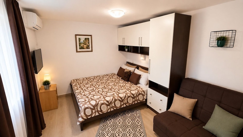 Imagen de la habitación del Hotel Family House with pool and sea view. Foto 9