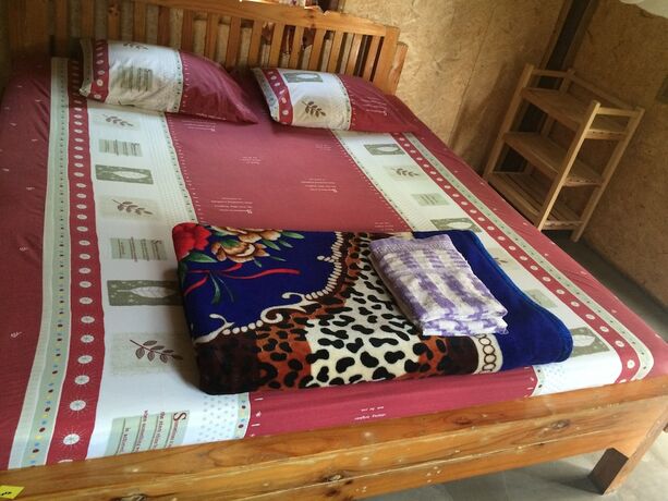 Imagen de la habitación del Hotel Family Huts. Foto 18