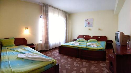 Imagen de la habitación del Hotel Family Iv. Foto 16