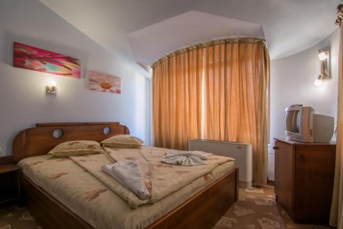 Imagen de la habitación del Hotel Family Iv. Foto 19