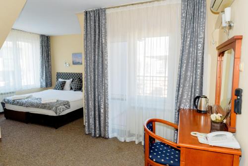 Imagen de la habitación del Hotel Family Prestige. Foto 17