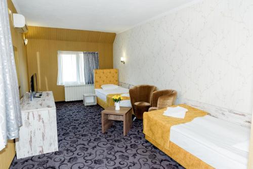 Imagen de la habitación del Hotel Family Prestige. Foto 18