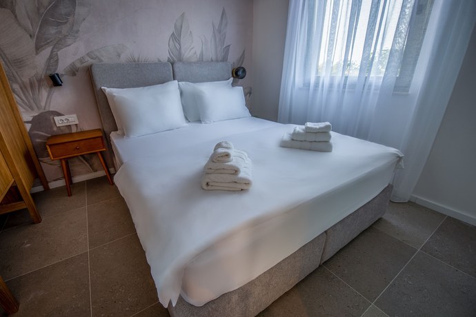 Imagen de la habitación del Hotel Family Resort Urania. Foto 13