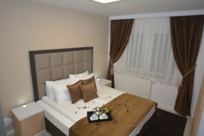 Imagen de la habitación del Hotel Family, Sarajevo. Foto 13