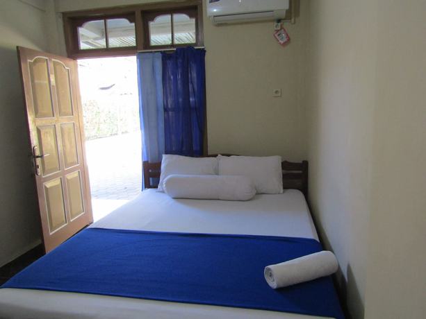 Imagen de la habitación del Hotel Family Syariah 1. Foto 2