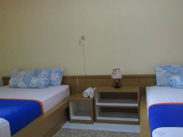 Imagen de la habitación del Hotel Family Syariah 1. Foto 3