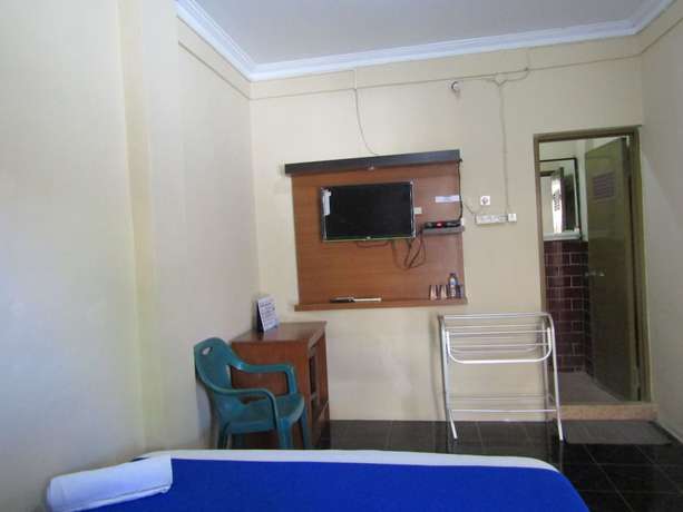 Imagen de la habitación del Hotel Family Syariah 1. Foto 4