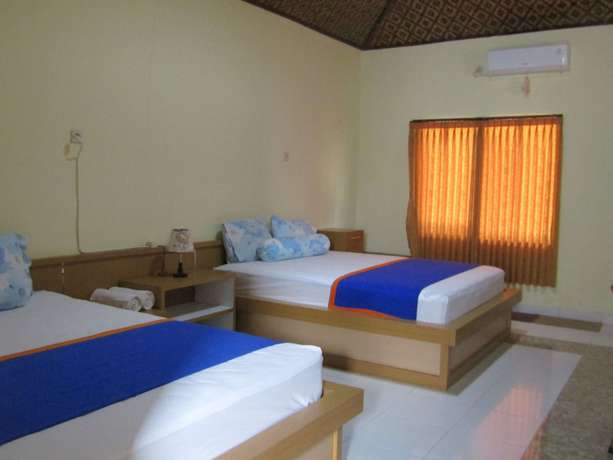 Imagen de la habitación del Hotel Family Syariah 1. Foto 5