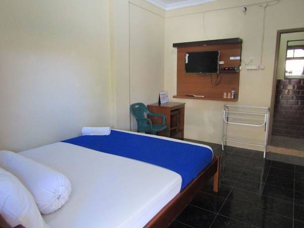 Imagen de la habitación del Hotel Family Syariah 1. Foto 6