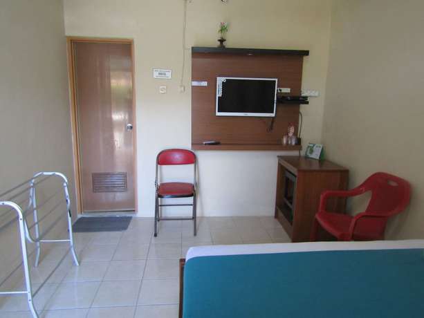 Imagen de la habitación del Hotel Family Syariah 1. Foto 8