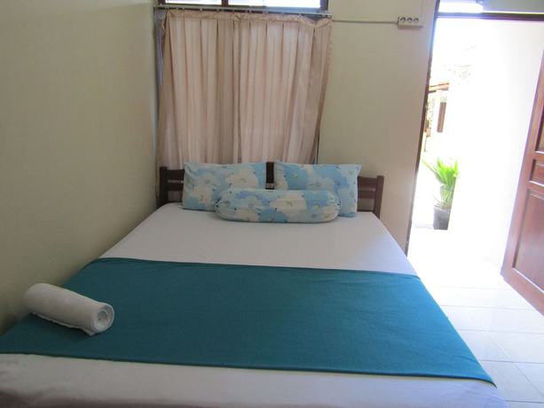 Imagen de la habitación del Hotel Family Syariah 1. Foto 10