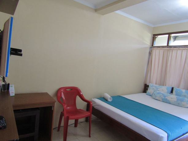 Imagen de la habitación del Hotel Family Syariah 1. Foto 16