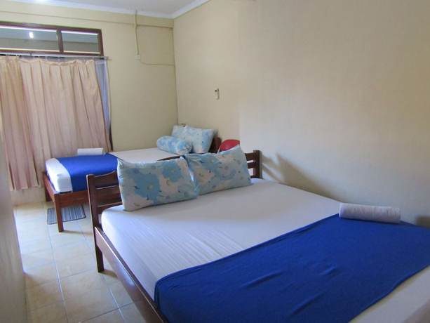 Imagen de la habitación del Hotel Family Syariah 1. Foto 18