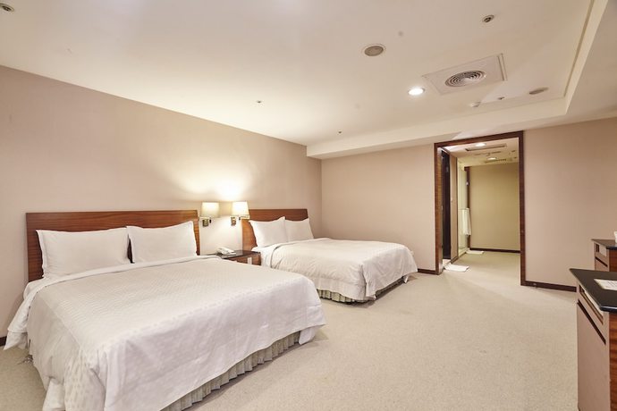 Imagen de la habitación del Hotel Family Taipei. Foto 8