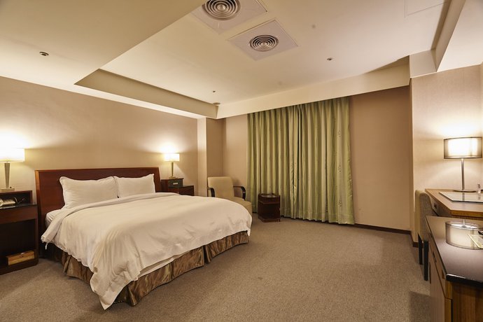 Imagen de la habitación del Hotel Family Taipei. Foto 18