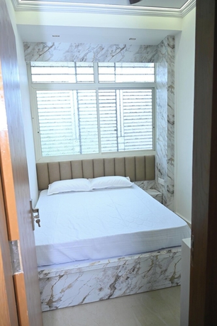 Imagen de la habitación del Hotel Family Ties Homestay. Foto 5