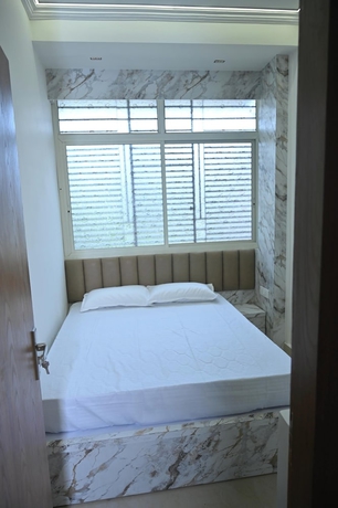 Imagen de la habitación del Hotel Family Ties Homestay. Foto 7