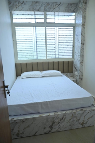 Imagen de la habitación del Hotel Family Ties Homestay. Foto 8