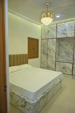 Imagen de la habitación del Hotel Family Ties Homestay. Foto 9