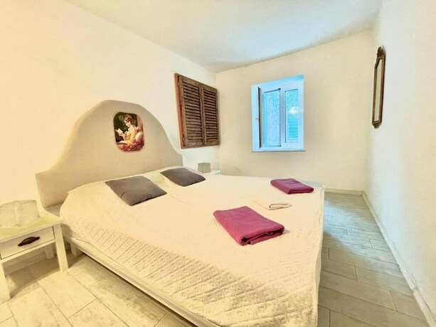 Imagen de la habitación del Hotel Family Two Bedroom House Old Town Budva. Foto 20