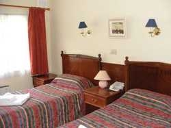 Imagen de la habitación del Hotel Famous Bein Inn. Foto 3