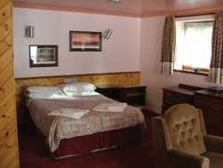 Imagen de la habitación del Hotel Famous Bein Inn. Foto 4