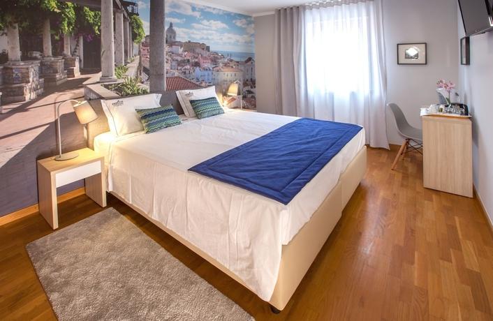 Imagen de la habitación del Hotel Famous Crows Lisbon Suites. Foto 5