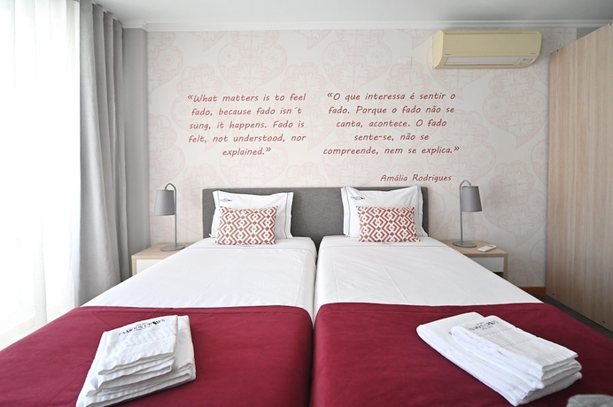 Imagen de la habitación del Hotel Famous Crows Lisbon Suites. Foto 6