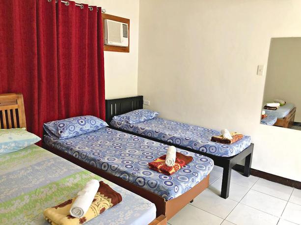 Imagen de la habitación del Hotel Famous Inn. Foto 5