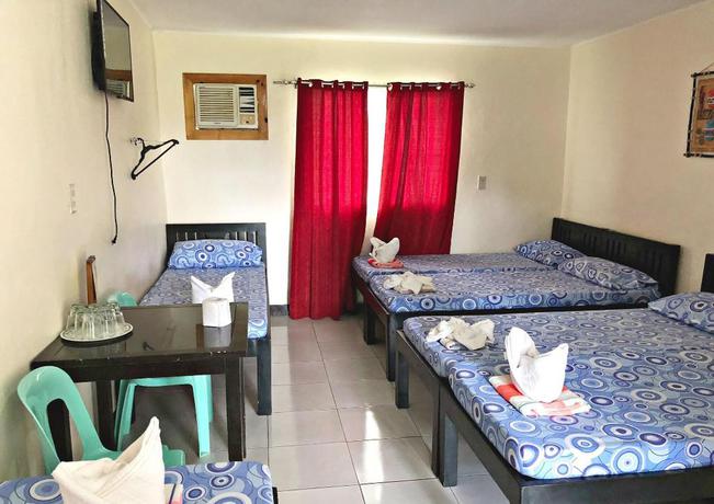 Imagen de la habitación del Hotel Famous Inn. Foto 16