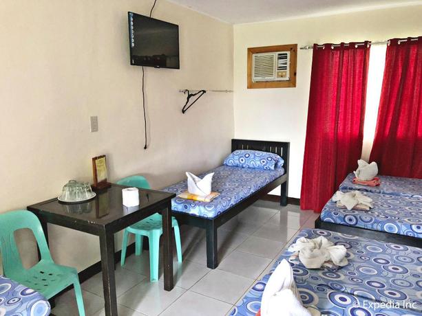 Imagen de la habitación del Hotel Famous Inn. Foto 17